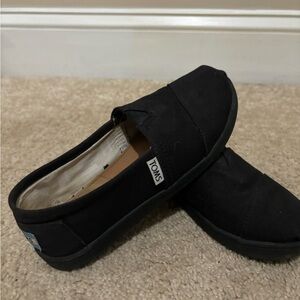Toms Black Canvas Slip-Ons